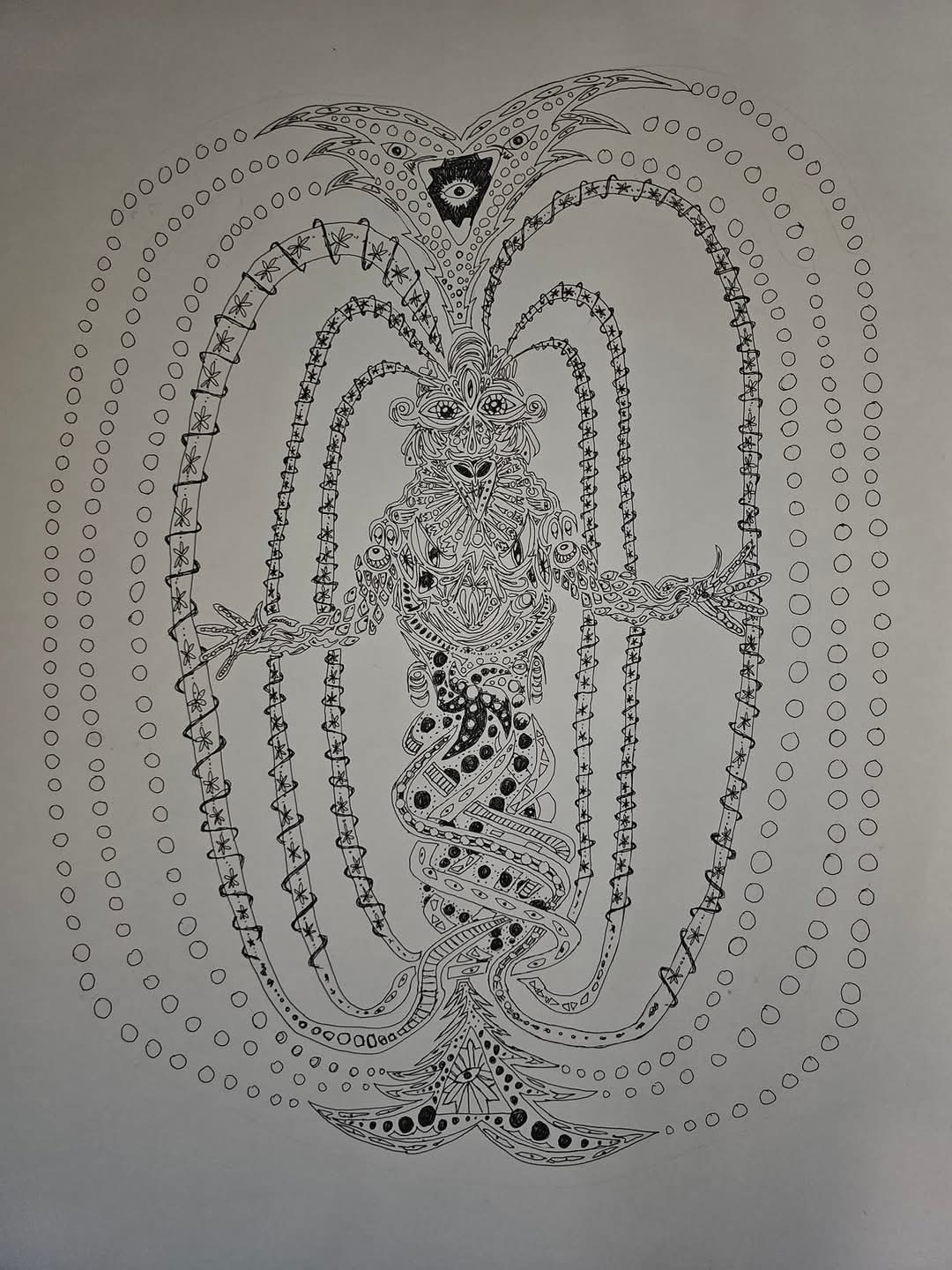 Black ink drawing on paper of a symmetrical, multi-eyed being with outstretched clawed hands and a serpentine lower body, enclosed in concentric rings of dots, with curved bands of star patterns arching around it and an eye in a triangle at the apex.
