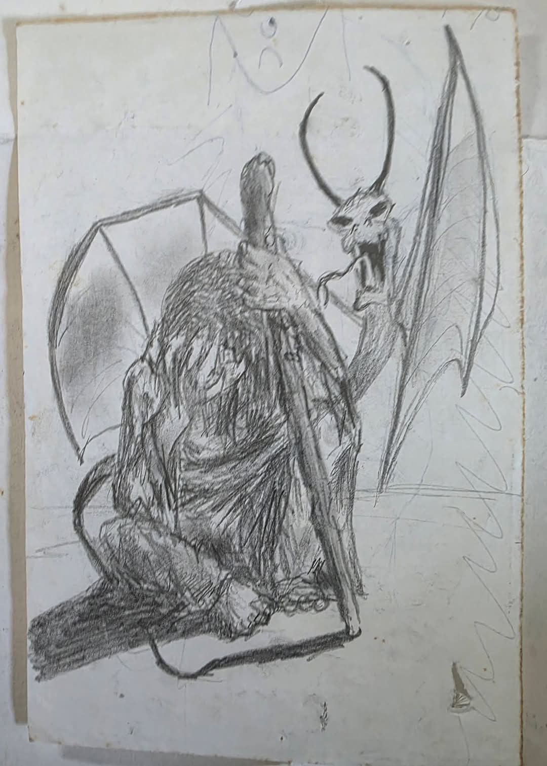 Graphite pencil drawing of a hunched, gaunt winged figure seated with its head bowed, gripping a tall staff with bony fingers, while a horned demonic creature with an outstretched wing looms behind it.