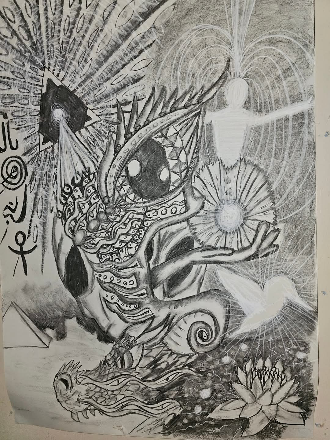 Charcoal and white chalk drawing on paper of a segmented, many-eyed entity holding out a radiant flower-like disc of light, with a glowing pyramid and all-seeing eye above, a luminous figure surrounded by field lines, a bird of light above a lotus on water, and a horned serpent's head below.